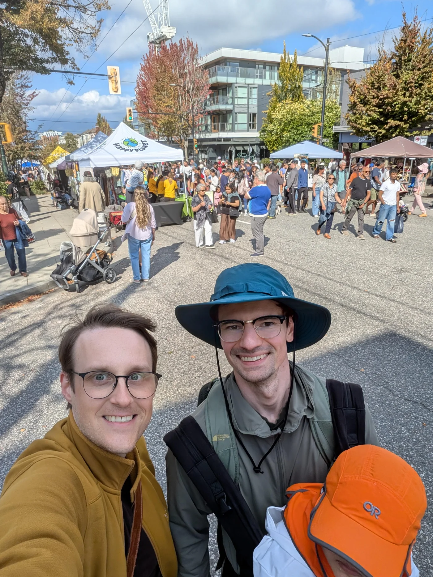 Julian Ertelt and Andrey Safonov, co-founders of OpenCommunity, at a Vancouver community street market