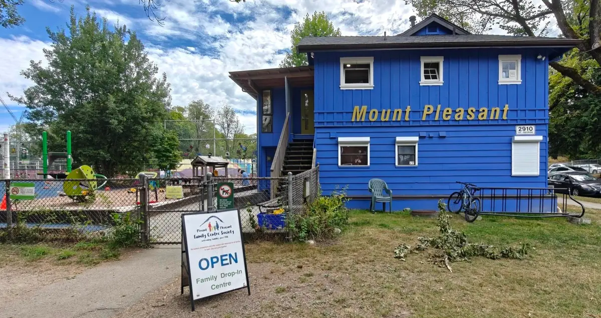Exterior of the Mount Pleasant Family Centre with the OPEN Family Drop-In Centre sign